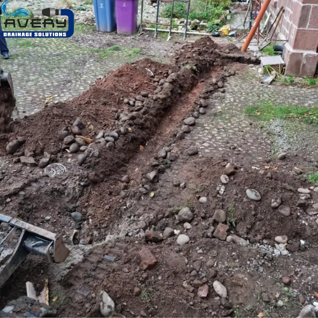 Excavated trench for drainage installation or repair work